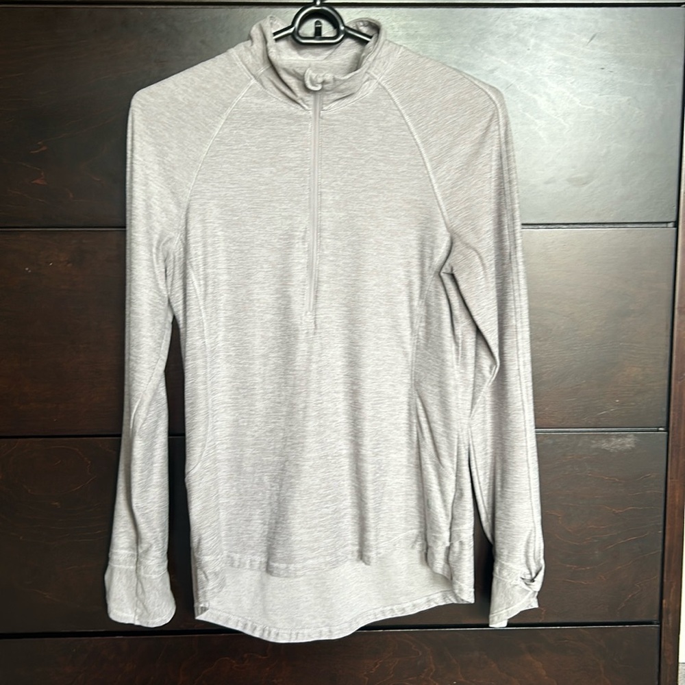 1/4 zip running top.